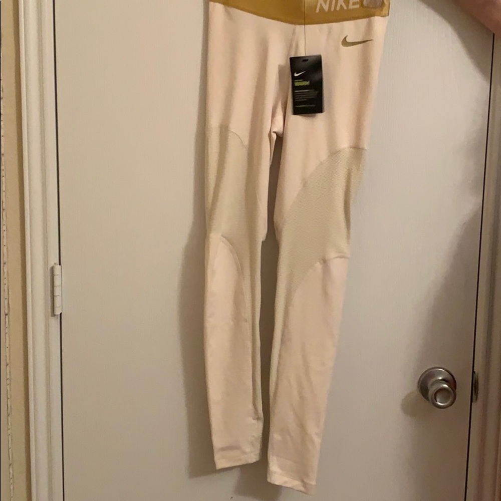 Gold Nike training pants!